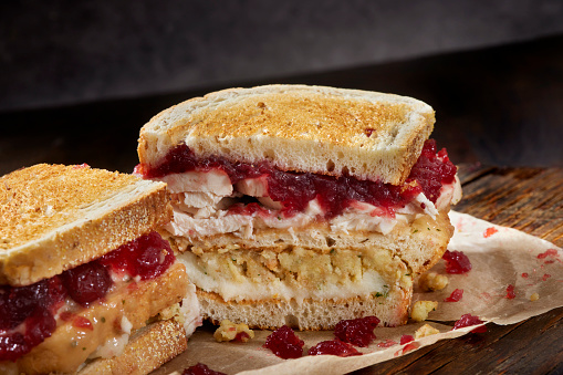 The Famous Moist Maker Turkey Sandwich with Left over Turkey, Stuffing, Mashed Potatoes, Cranberry Sauce and a Middle Slice Soaked in Gravy