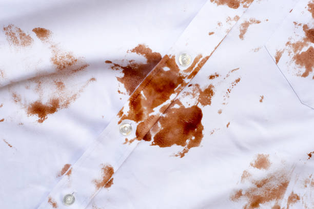 istock Dirty choclate stain on white shirt 1829039122