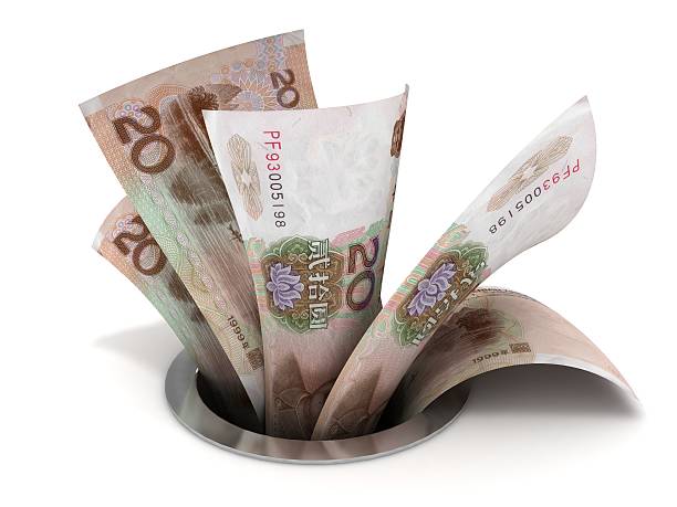 istock Money Down the Drain - Chinese Yuan 182904450