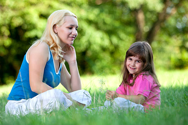 istock Mother and daughter in the park 182904672