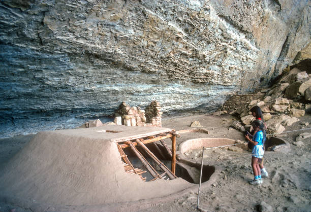Mesa Verde NP - Step House - Girls Look at Pit House  - 1990. Scanned from Kodachrome 25 slide.