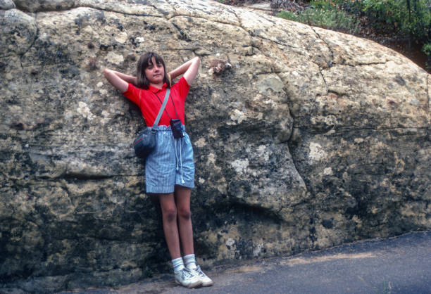 istock Mesa Verde NP - Step House - Girl Pauses on Trail  - 1990 1829051784