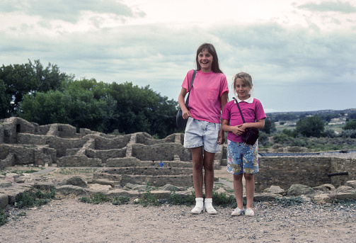 Aztec Ruins NM - Two Girl Visitors  - 1990. Scanned from Kodachrome 64 slide.