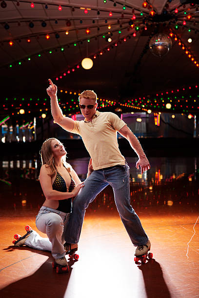 istock Young couple roller skating disco fever 80s style 182905738