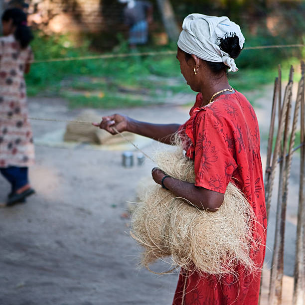 istock Women weaving a rope 182905833