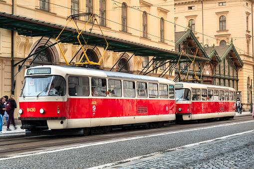 View of the Peace Arch with yellow tram in Milan, Italy