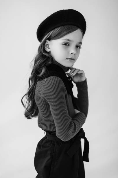 istock Girl in studio on white background. Retro style. Black and white photography 1829068228