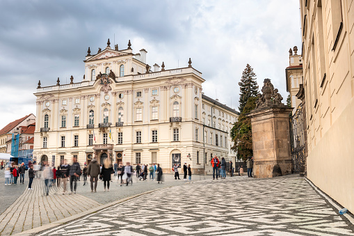 Prague, Czechia - September 17, 2022:  People gather in the courtyard by the Archbishop Palace in the Prague Castle complex Czech Republic Czechia Europe