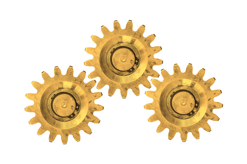 Three gold gears are isolated white background. Cogwheels.