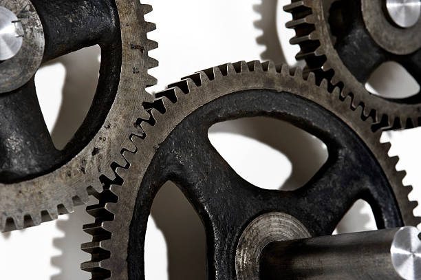 istock Close-up of three Gears working together 182907259