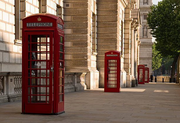 istock Red telephone boxes, London morning 182907267