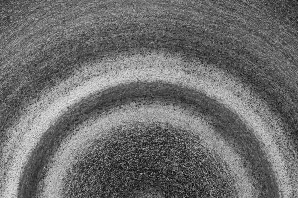 Abstract monochrome semicircle stripes with cyan stripes.