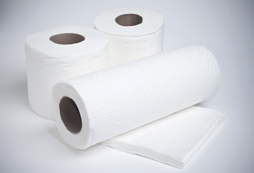 Close up shot of toilet papers, table napkins and paper towel together. 