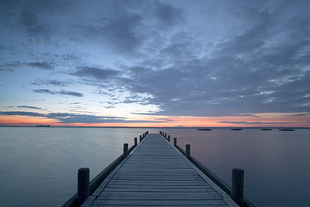 istock Lakeside Jetty at dusk with majestic cloudscape (XXL) 182908060