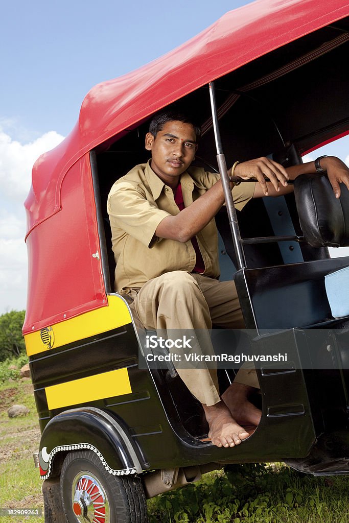 Pensive Indian Auto Rickshaw Driver 18-19 Years Stock Photo