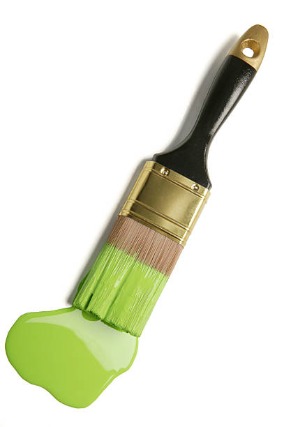 paintbrush and green paint blob(w/clipping path)