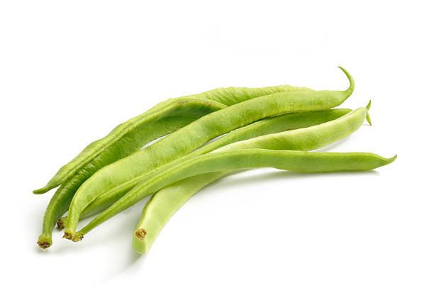 Runner Bean Six Runner Beans pods fresh out of the garden isolated on a white background runner bean stock pictures, royalty-free photos & images