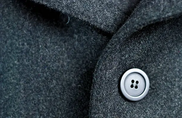 Photo of Dark wool coat with one black button