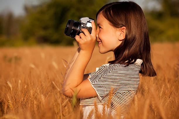 istock Girl taking a picture 182910876