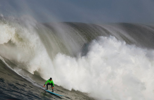 Surfing a Huge Wave