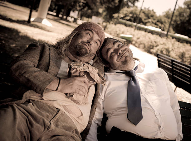 Bum drinking with businessman "Bum drinking with businessmanItalypse 2010 - MilanMy images are processed from 16 bit RAW files in PROPHOTO colorspace,as possible to maintain the color fidelity when viewing on different devices and in the case of print for a correct and optimal conversion to CMYKSpecial thanks:Gli zii Zone creative & Zio Franco" tramp home stock pictures, royalty-free photos & images
