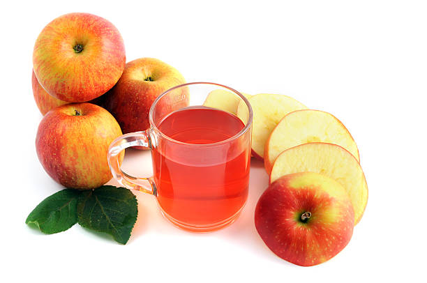 istock apple tea in glass with decorative leaf - Apfeltee 182911063