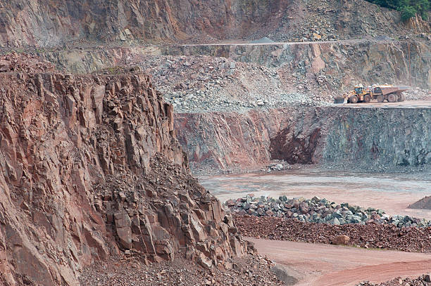 istock Open-pit Mine with Earth Mover and Dump Truck 182911218