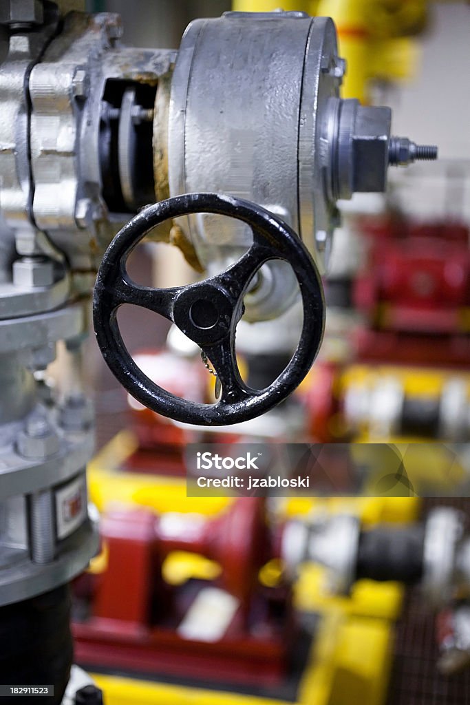 boiler room valve a closeup shot of a main valve in a boiler room. Ring Boiler Stock Photo