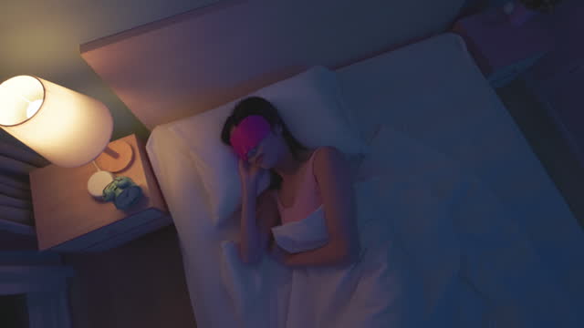 asian woman night sleep mask