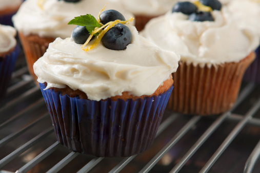 Blueberry and lemon  cupcakes fresh out of the oven.