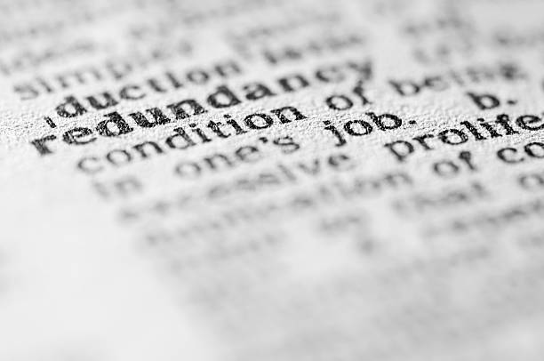 istock Dictionary definition of redundancy in black type 182913293