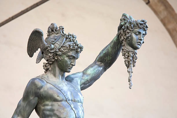 Perseus and Medusa "Perseus holding head of Medusa, bronze statue created by Benvenuto Cellini in 1554 and exposed in Loggia de Lanzi.The famous Loggia is right next to the Uffizi art gallery, Palazzo Vecchio, and Piazza della Signoria in Florence.Click for more pics:" mythological character stock pictures, royalty-free photos & images