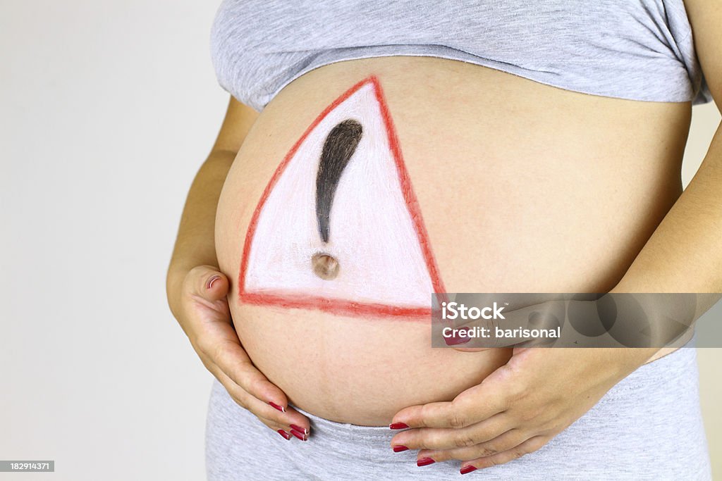 Exclamation mark and Pregnancy Pregnant Stock Photo