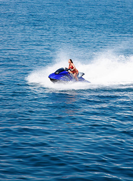 istock Beautiful woman riding a sky-jet 182914466