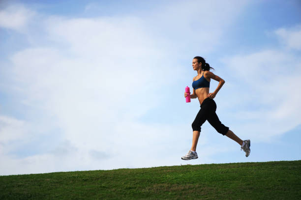istock Young Woman Running Jogging 182914502