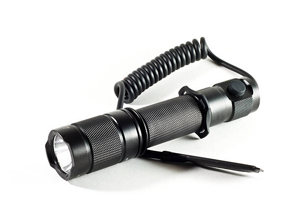 torcia tattica a led con commutatore di pressione - tactical flashlight foto e immagini stock