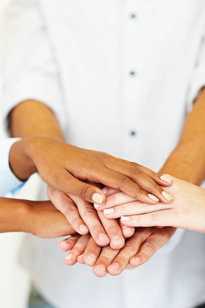 istock Group of business colleagues showing unity 182914618