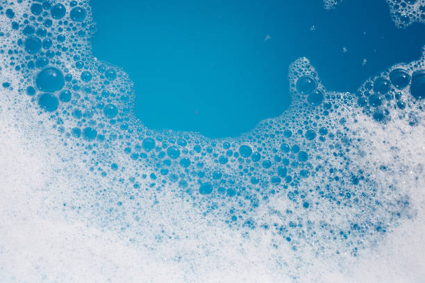 istock Detergent foam bubble on wate. Blue background, Soap sud 1829148347