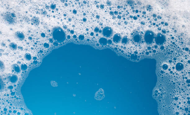 istock Detergent foam bubble on wate. Blue background, Soap sud 1829148357
