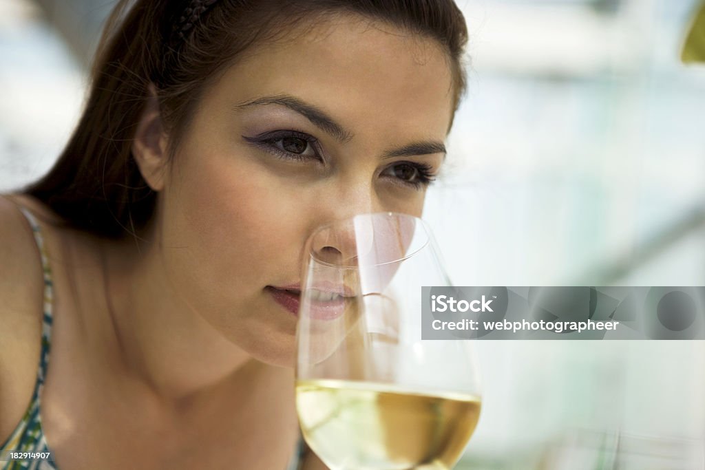Winetasting "Young woman tasting wine, Canon 1Ds mark III" Tasting Stock Photo