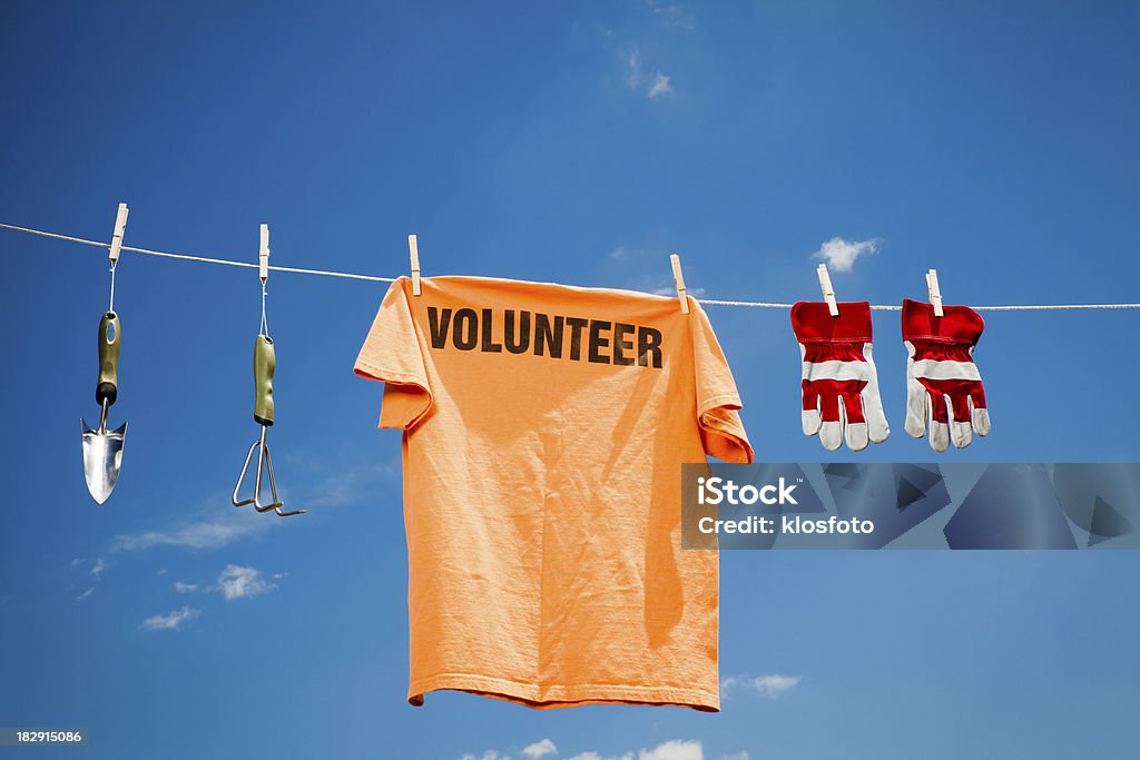 Concepto de voluntarios - Foto de stock de Camiseta libre de derechos