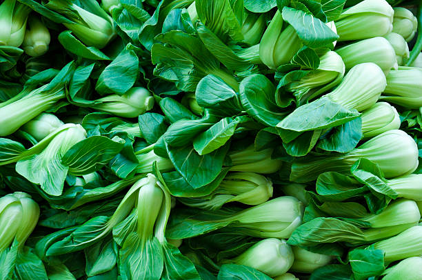 Green legumes in a street market