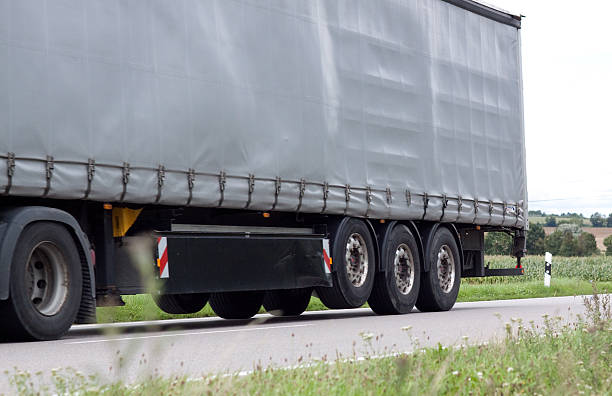 istock truck on street 182915939