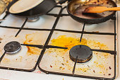 Dirty kitchen gas stove.
