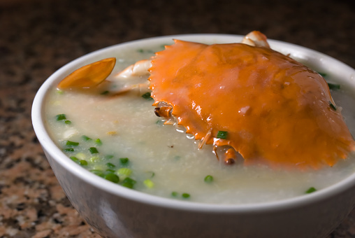 A bowl of Crab Congee in traditional chinese style