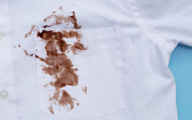 istock Dirty choclate stain on white shirt 1829173144