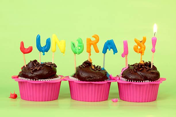 istock Cupcakes with Melted Congrats Candles 182917987