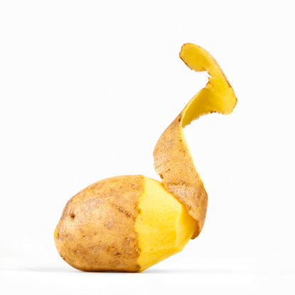 Peeled Potato on white Background