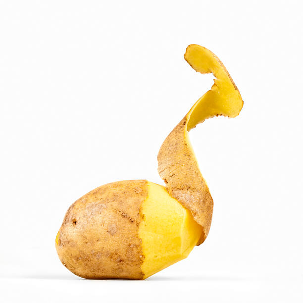 obrane ziemniaków - potato skin zdjęcia i obrazy z banku zdjęć