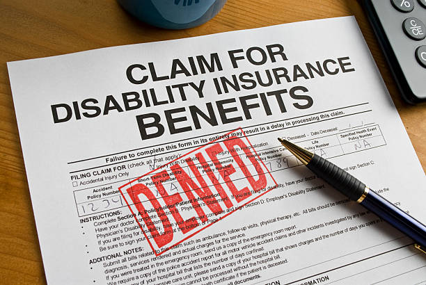 disability benefits formularza - insurance claim form rejection physical injury zdjęcia i obrazy z banku zdjęć